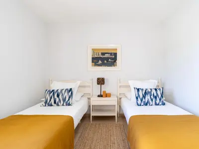 Cama o camas de una habitación en Beachfront San Agustin Papagayos II