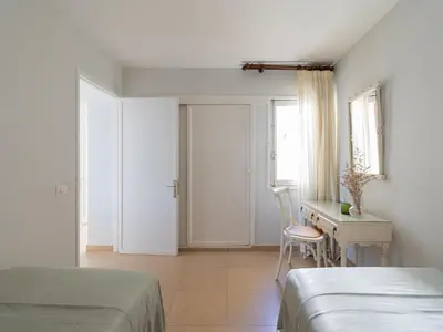 Cama o camas de una habitación en Beachfront San Agustin Papagayos II