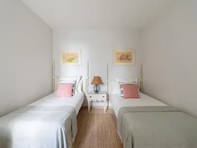 Cama o camas de una habitación en Beachfront San Agustin Papagayos II