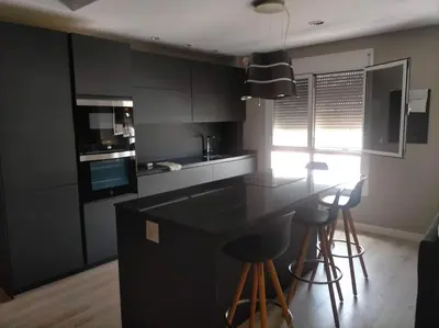 Una cocina o zona de cocina en luminoso duplex en Las Canteras (Surf Zone)