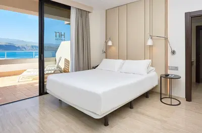 Cama o camas de una habitación en NH Imperial Playa