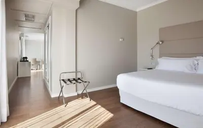 Cama o camas de una habitación en NH Las Palmas Playa las Canteras