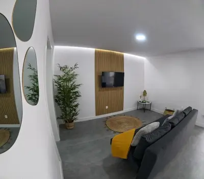 Una televisión o centro de entretenimiento en Violeta Suite