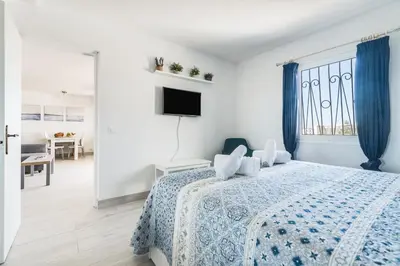 Cama o camas de una habitación en Home2Book Stunning Apartment Rocas Rojas