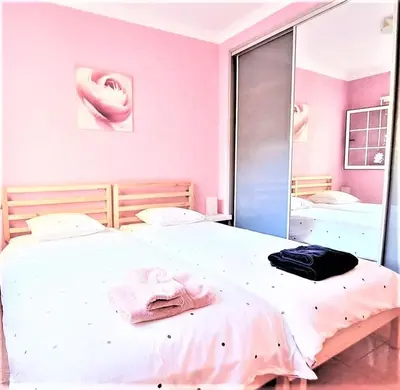Cama o camas de una habitación en Nice Apartment with Swimmingpool, Wifi and Free Parking in Arguineguin