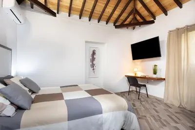 Cama o camas de una habitación en Casa Evaristo with Roque Nublo view