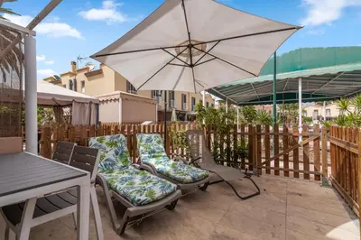 Un balcón o terraza de Home2Book Cozy Duplex Green Oasis Maspalomas