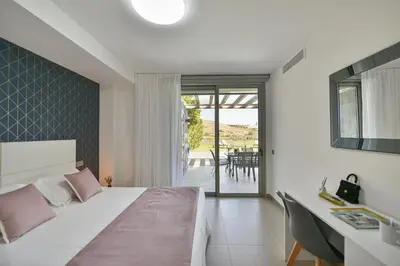 Cama o camas de una habitación en Los Dragos 13 Salobre by VillaGranCanaria