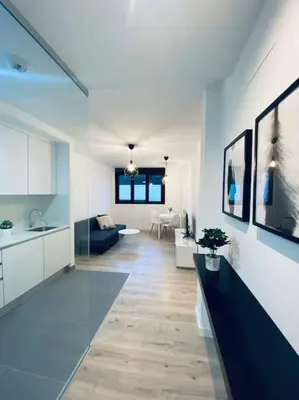 Una cocina o zona de cocina en Acogedor y cómodo apartamento con piscina