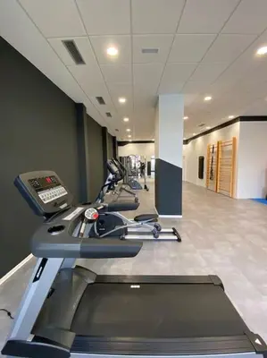 Gimnasio o instalaciones de fitness de Acogedor y cómodo apartamento con piscina
