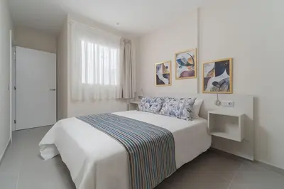 Cama o camas de una habitación en Las Afortunadas , Playa Arinaga 1ºA