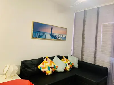 Zona de estar de Palm apartment