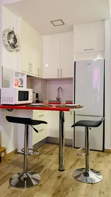 Una cocina o zona de cocina en Palm apartment