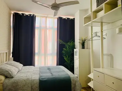 Cama o camas de una habitación en Palm apartment