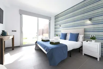 Cama o camas de una habitación en Salobre La Isla 8