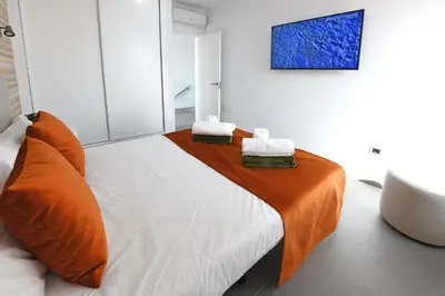 Cama o camas de una habitación en Salobre La Isla 8