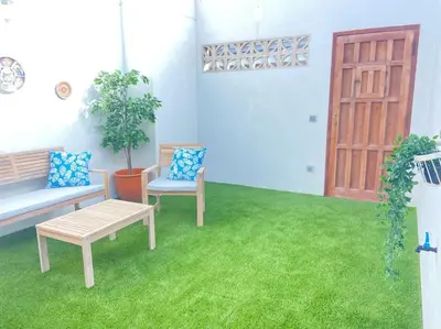 Jardín al aire libre en Casita Estrella con entrada independiente y patio