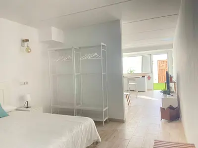 Cama o camas de una habitación en Casita Estrella con entrada independiente y patio