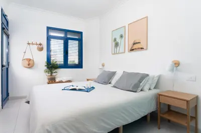 Cama o camas de una habitación en Agaete White&Blue House