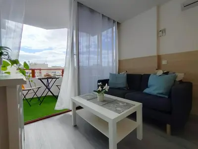 Zona de estar de Light Blue Holiday Home