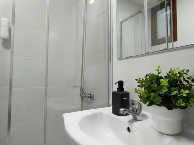 Un baño de Light Blue Holiday Home