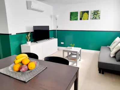 Una televisión o centro de entretenimiento en Malibú Mogán Casa Cactus - Wifi - Beach - AC