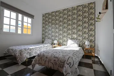 Cama o camas de una habitación en Aloha***Burrero cerca del Aeropuerto