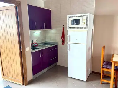 Una cocina o zona de cocina en Apartamento vista mar en Flamboyan - San Agustín