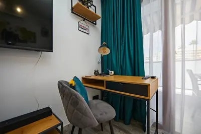 Una televisión o centro de entretenimiento en Apartamento Panda House