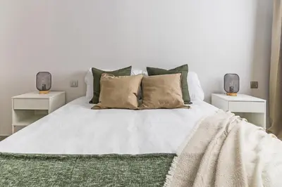 Cama o camas de una habitación en Home for the Digital Nomads Next to the Beach