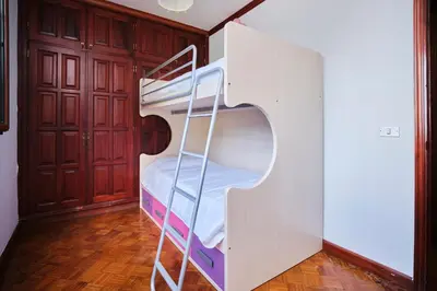 Cama o camas de una habitación en La casita del puerto