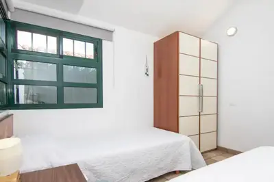 Cama o camas de una habitación en Deluxe Las Palomas - by Gestión Vacacional Canarias