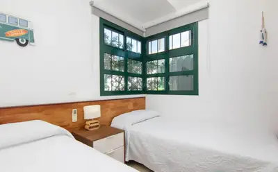 Cama o camas de una habitación en Deluxe Las Palomas - by Gestión Vacacional Canarias