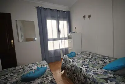 Cama o camas de una habitación en PLAYA DEL NORTE VIVIENDA VACACIONAL