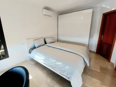 Cama o camas de una habitación en Villa Playa Amadores - Luxury villa with heated pool