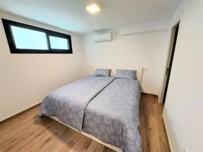 Cama o camas de una habitación en Villa Playa Amadores - Luxury villa with heated pool