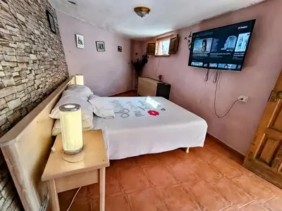 Una televisión o centro de entretenimiento en AgroRural La Rueda