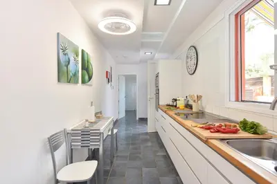 Una cocina o zona de cocina en El Flamboyan Golf by VillaGranCanaria