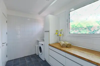 Un baño de El Flamboyan Golf by VillaGranCanaria