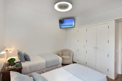 Cama o camas de una habitación en El Flamboyan Golf by VillaGranCanaria