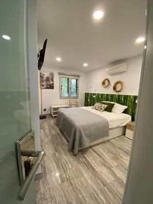 Cama o camas de una habitación en First Beachline Deluxe with Garden and Terrasse in Sun Club