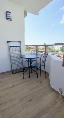 Un balcón o terraza de Pequeño y acogedor 4th by CASAS COCODRILO