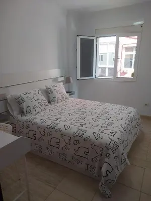 Cama o camas de una habitación en Playa Canteras Aqui Te Espero