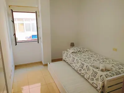 Cama o camas de una habitación en Playa Canteras Aqui Te Espero