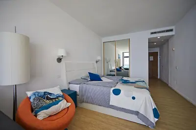 Cama o camas de una habitación en Ocean View Apartment