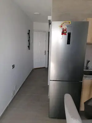 Una cocina o zona de cocina en Quiet & Bright Apartment with private garden