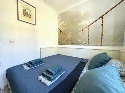 Cama o camas de una habitación en Las Olas DM cozy 2-bedrooms apartment