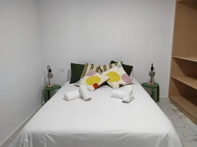 Cama o camas de una habitación en HOLA SUITE