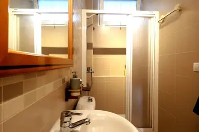 Un baño de Apartment with large terrace, 10 meters from Playa de las Burras