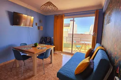 Una televisión o centro de entretenimiento en Casita Canaria Playa Beachfront Access & Lateral Ocean View With Terrace